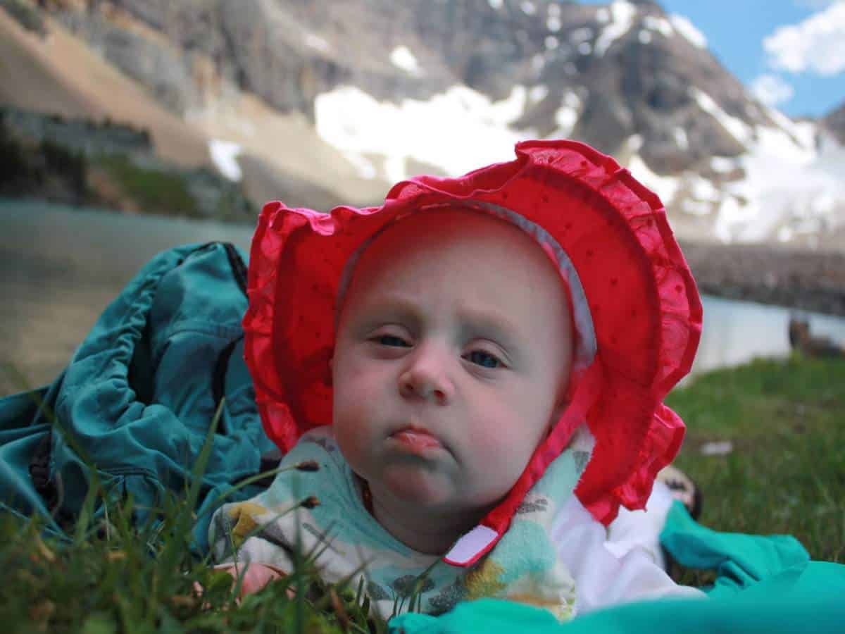 What to pack - Baby wearing a sunhat on a hike in Yoho National Park, Canada