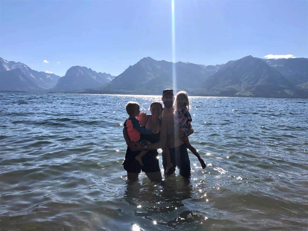 Family swimming in Jackson Lake