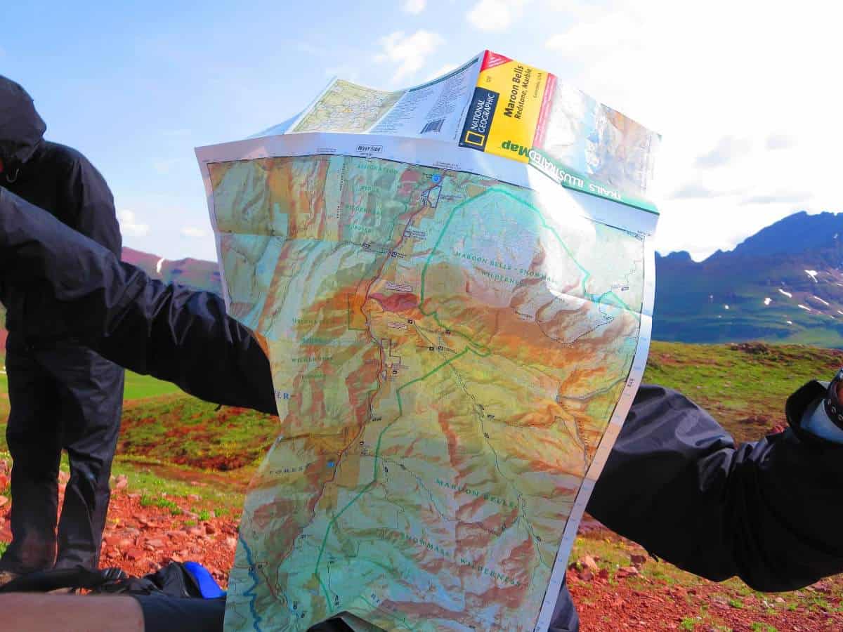 Map blown by the wind in Bryce's face