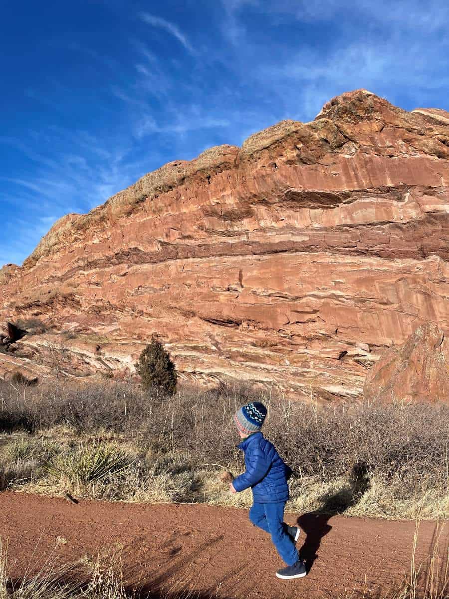 Boy running at Red Rocks