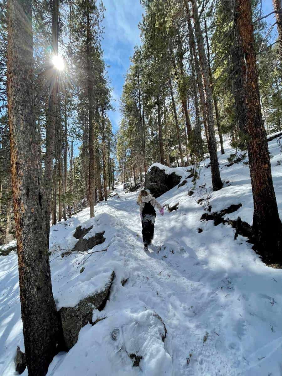 Girl hiking in the snow