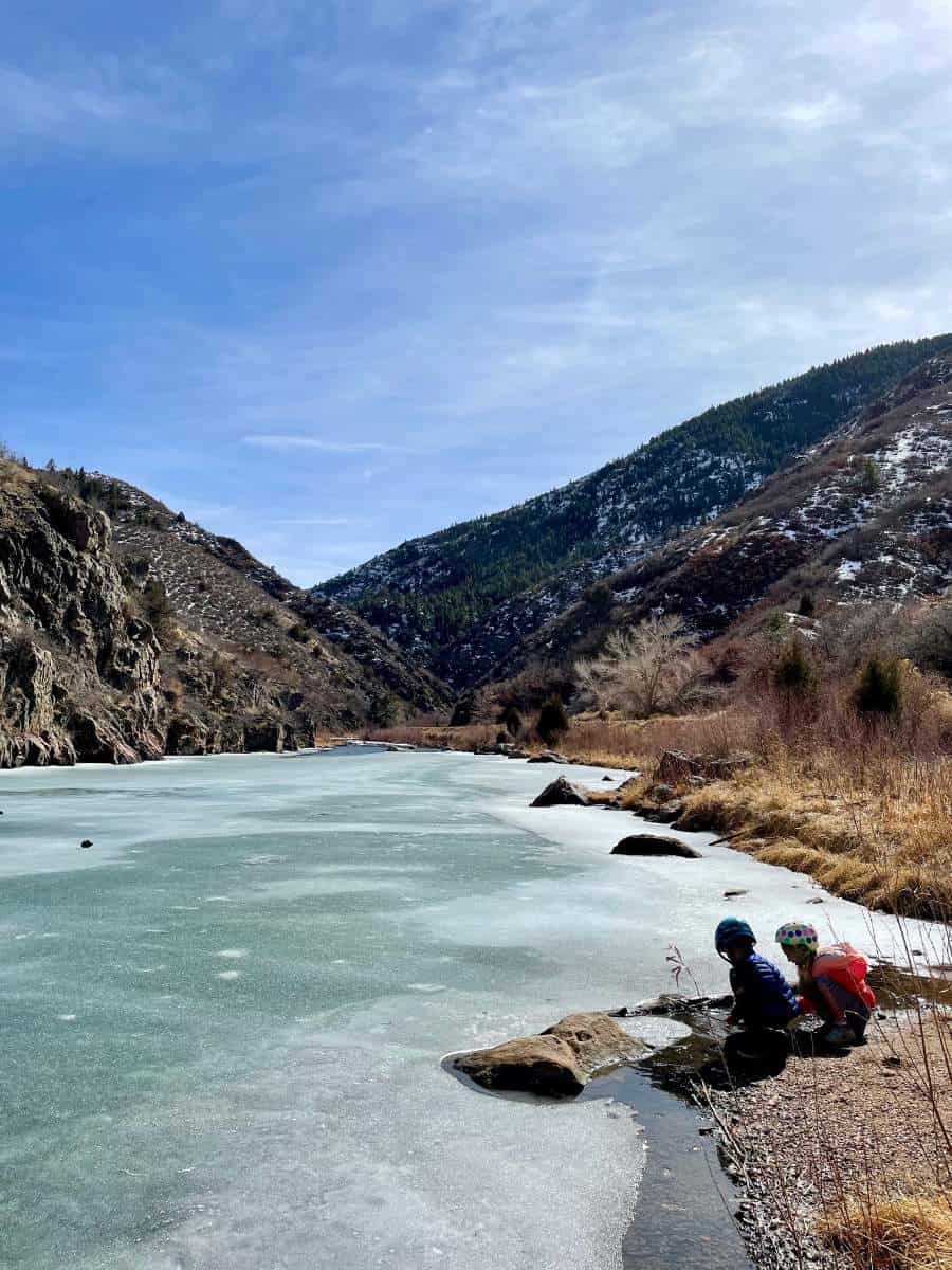 Kids by the frozen river