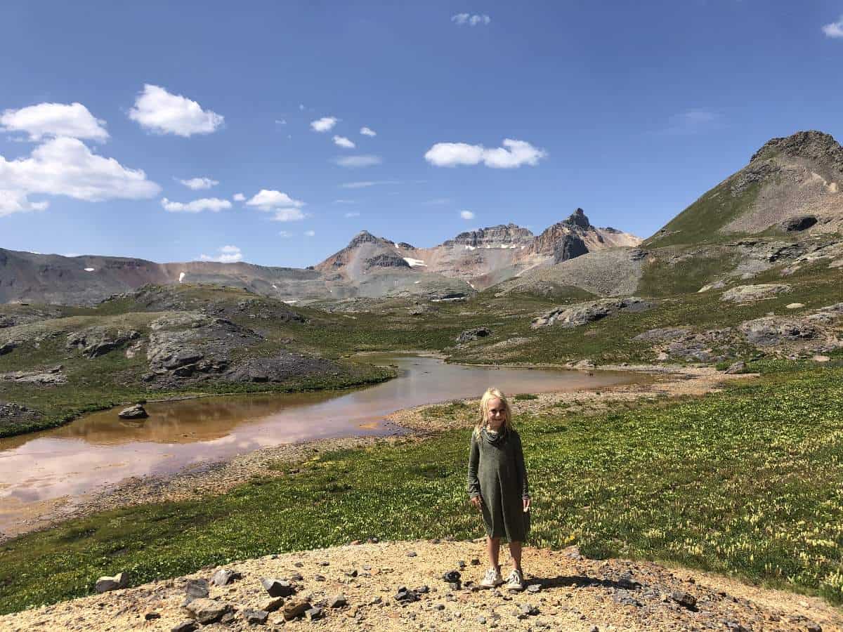 girl in front of lake