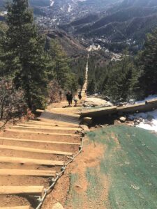 Mom and son climbing Manitou Incline