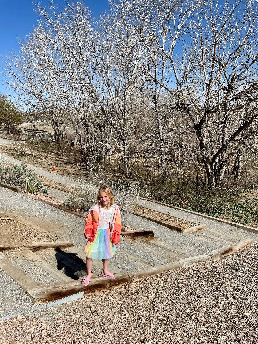 girl on nature trail at Butterfly Pavilion