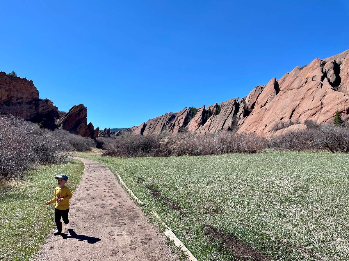 boy running on trail