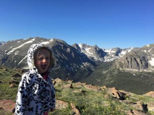 girl with Colorado mountain views