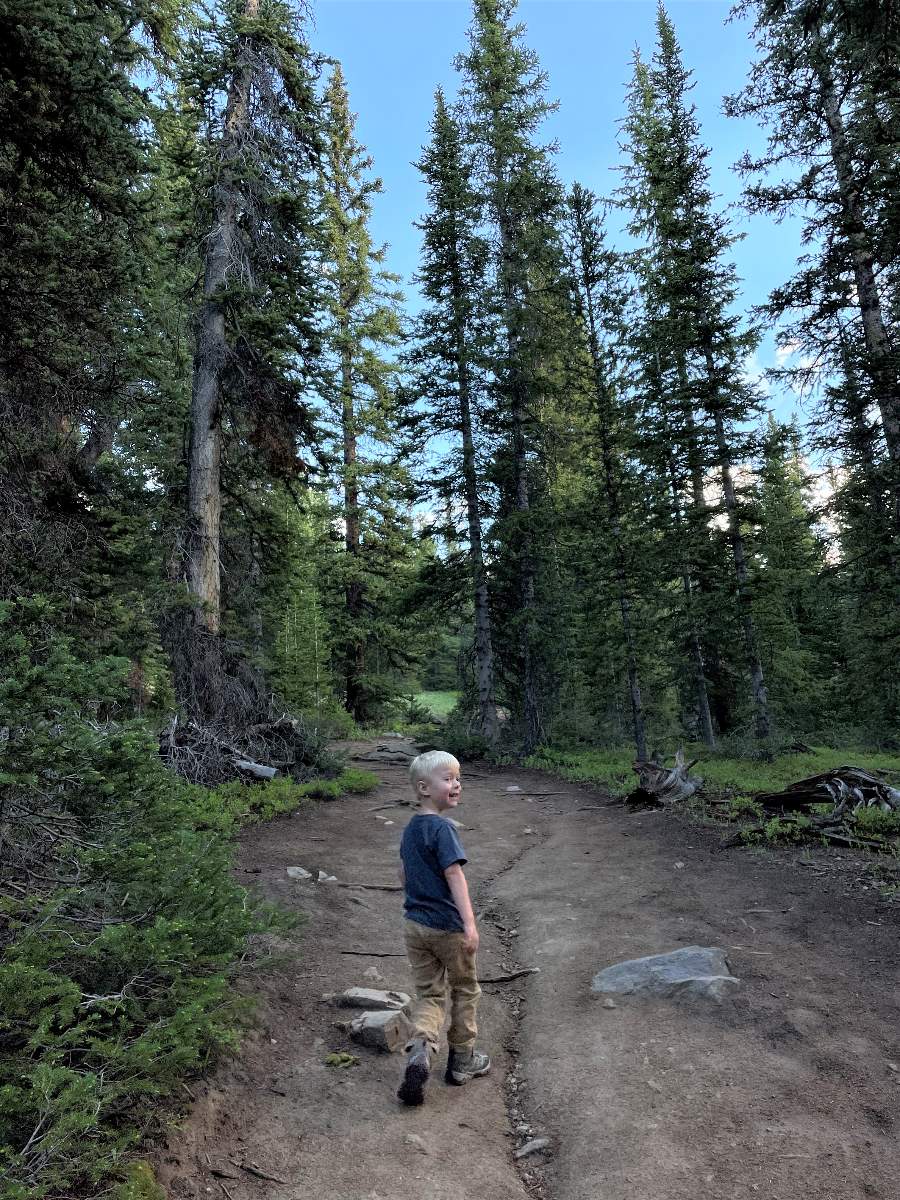 boy hiking in hiking boots for kids
