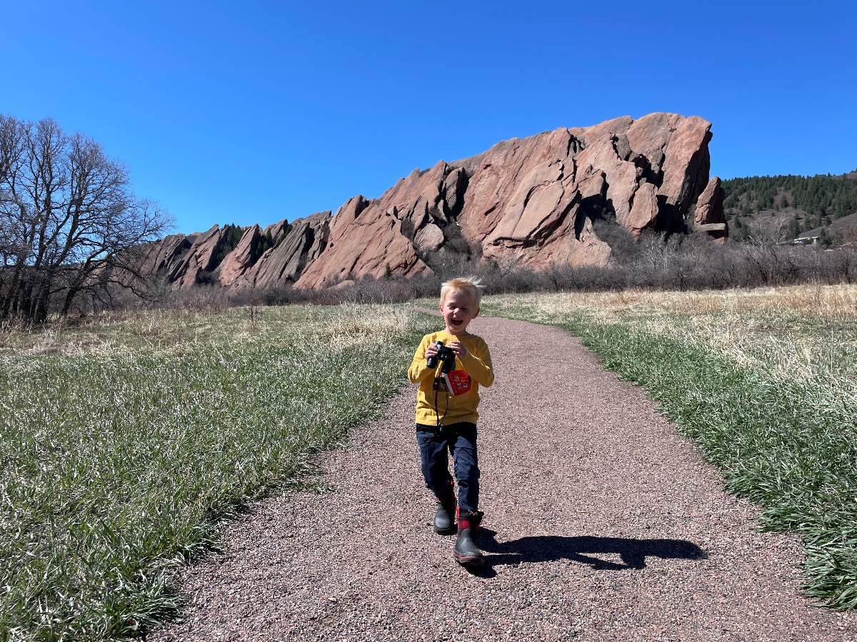 Boy hiking in rainboots