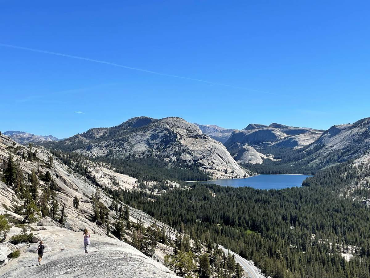 Kids hiking with Tenaya Lake in background