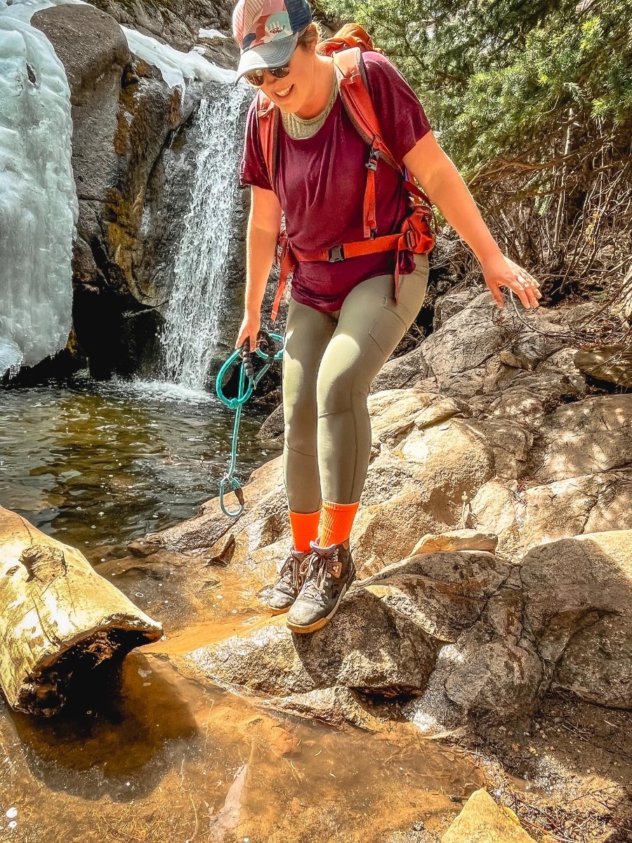 woman hiking in orange socks
