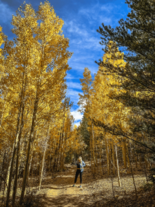 woman hiking Abyss Trail, best fall hikes near Denver