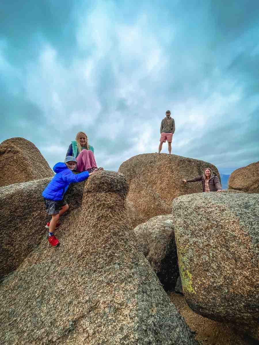 Kristin and Family Climbing on Rocks