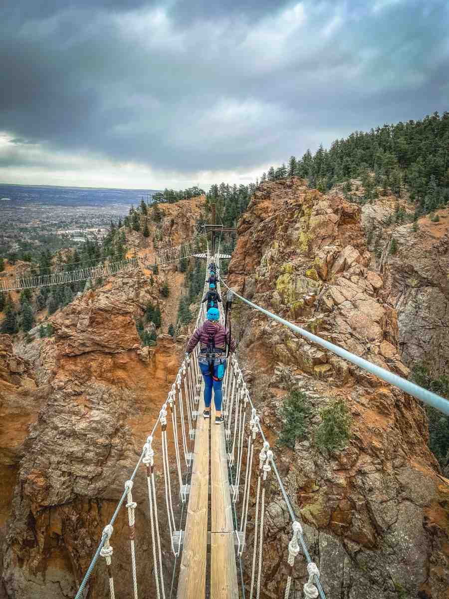 Kristin Walking Across Suspension Bridge