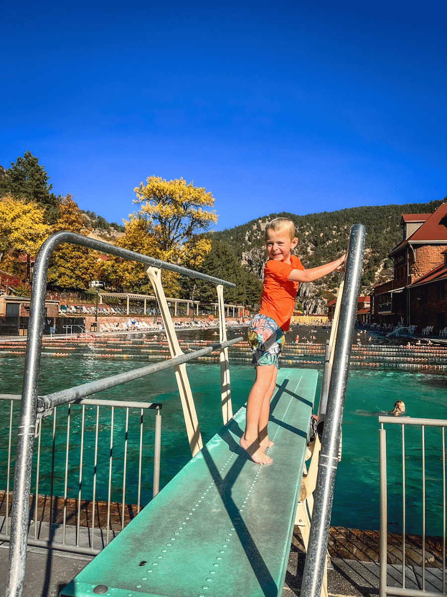 Boy on diving board at Glenwood Hot Springs Pool