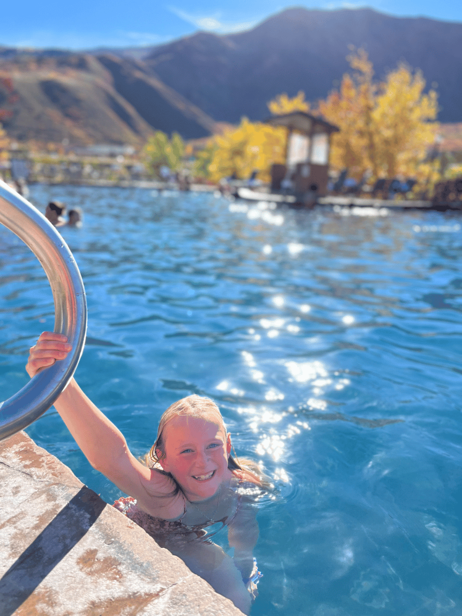 Girl in pool at Iron Mountain Hot Springs