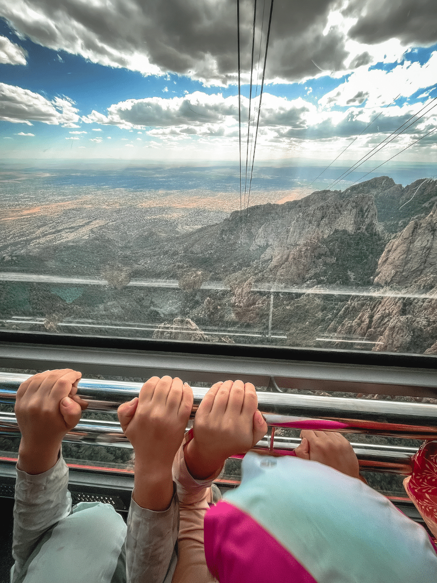Kids looking down on Sandia Peak Tramway